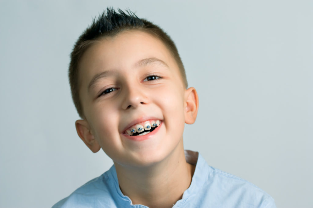 Young boy with braces