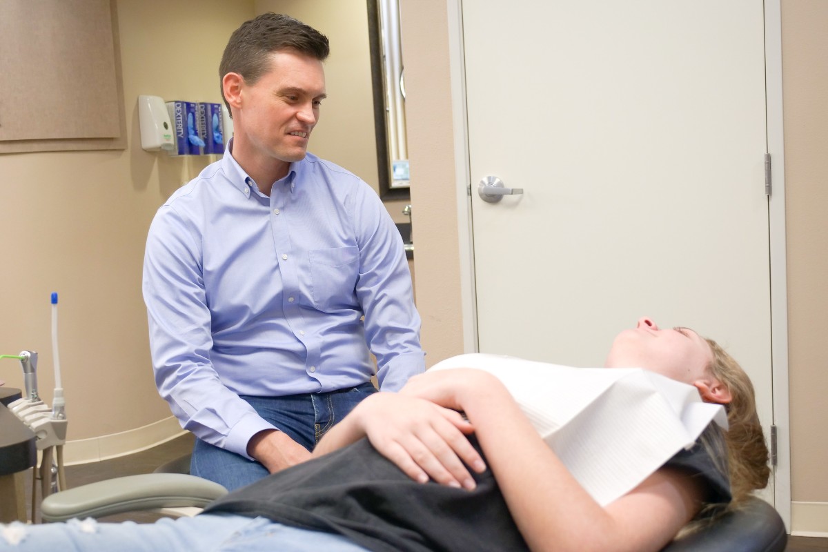 Dr. Lee talking with a patient