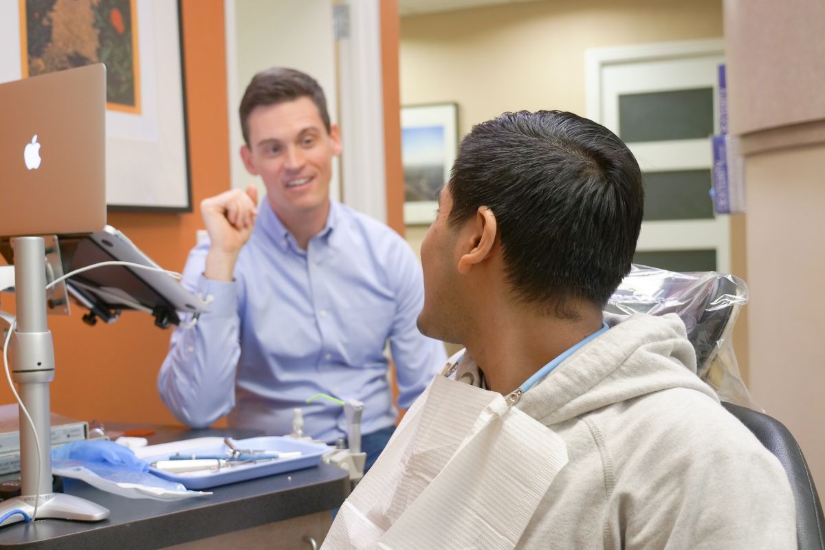 Dr. Lee talking to a patient